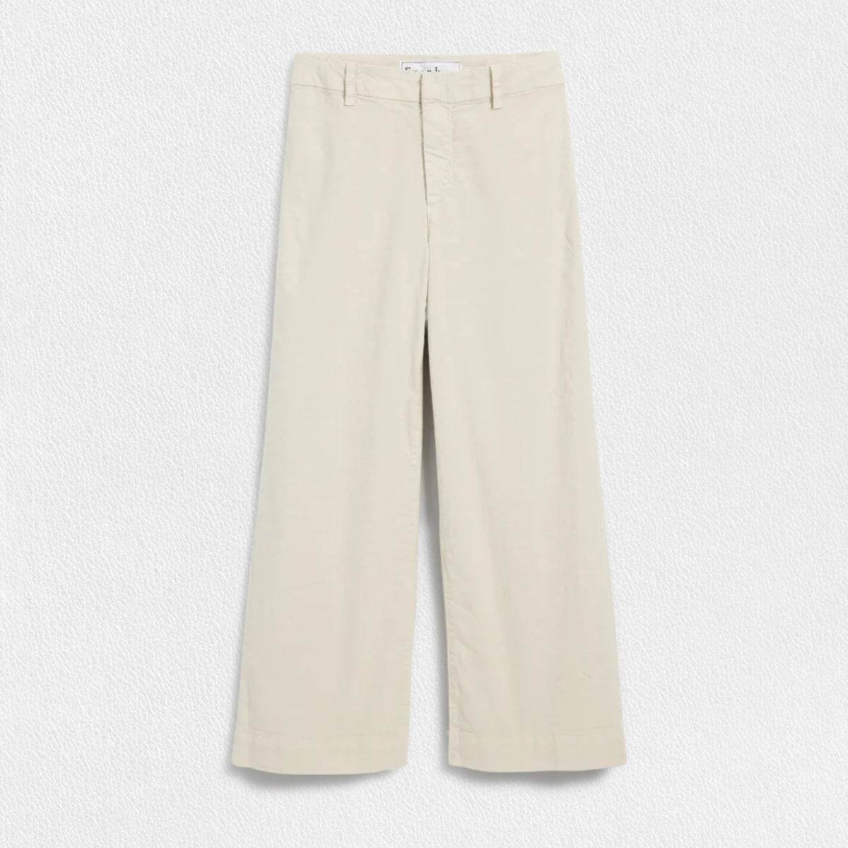 The FRANK &amp; EILEEN Wexford Wide Leg Linen Pants in Cement are showcased against a light textured background. These Italian Performance Linen pants feature a fitted waist with belt loops and a zip fly with button closure. The bottom hems are neatly finished, providing a clean, tailored appearance.