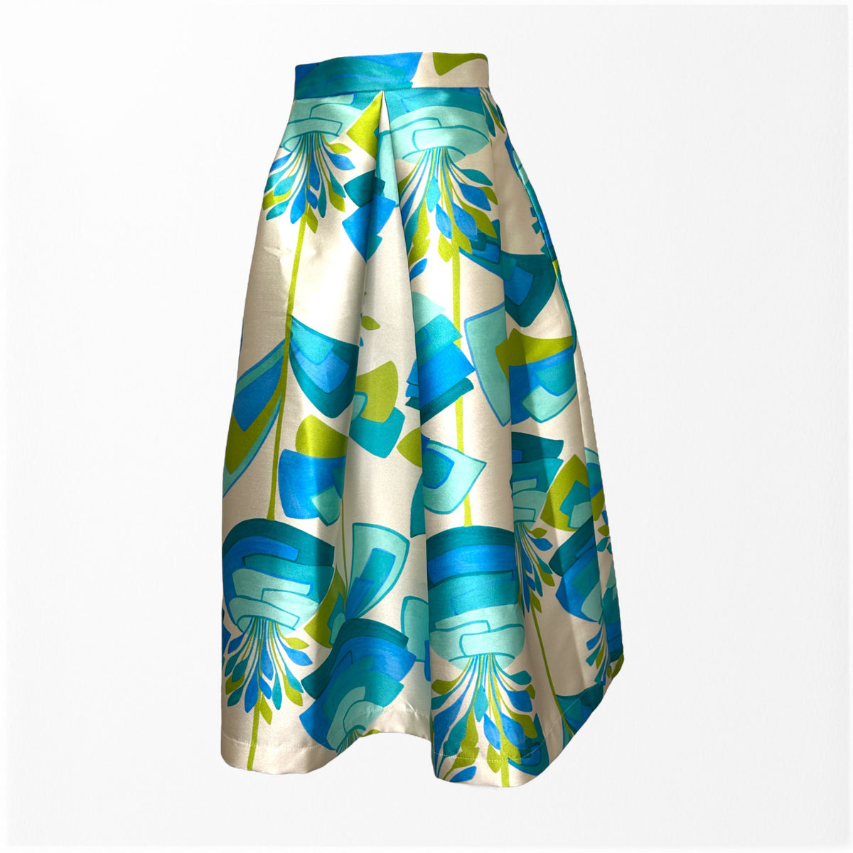 Introducing the MIDI STRUCTURED SKIRT by ALYKI LABORATORIO, a high-waisted A-line skirt that showcases a striking abstract floral pattern in vibrant shades of pink and red on a cream backdrop. Crafted in Italy, this voluminous piece features soft, elegant pleats for a refined yet bold look.