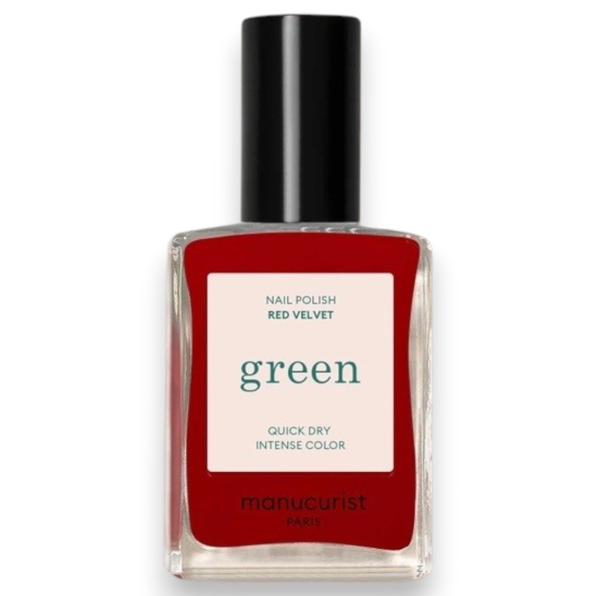 A hand with neatly manicured nails painted in MANUCURIST - GREEN™ NAIL POLISH IN RED VELVET by MANUCURIST INC rests on a textured red leather surface, creating a coordinated and stylish look.