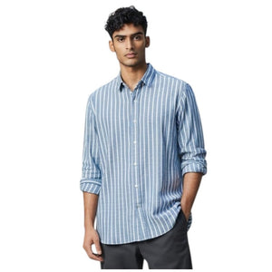 The FRANK & EILEEN Finbar men's button-up shirt in turquoise with white stripes features washed linen, a back view, and long sleeves rolled up.
