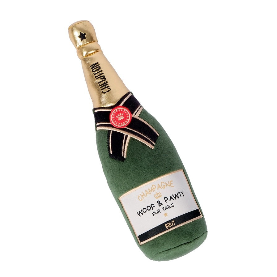 Crafted by CHEWFFON, the PLUSH CHAMPAGNE BOTTLE SQUEAKY DOG TOY is designed to resemble a champagne bottle with playful gold, black, and red accents. The neck features the label “CHAMPUTON,” while the front reads “CHAMPAGNE WOOF & PAWTY FUR TAILS BRUT.” This interactive dog toy is perfect for pups who love to celebrate.