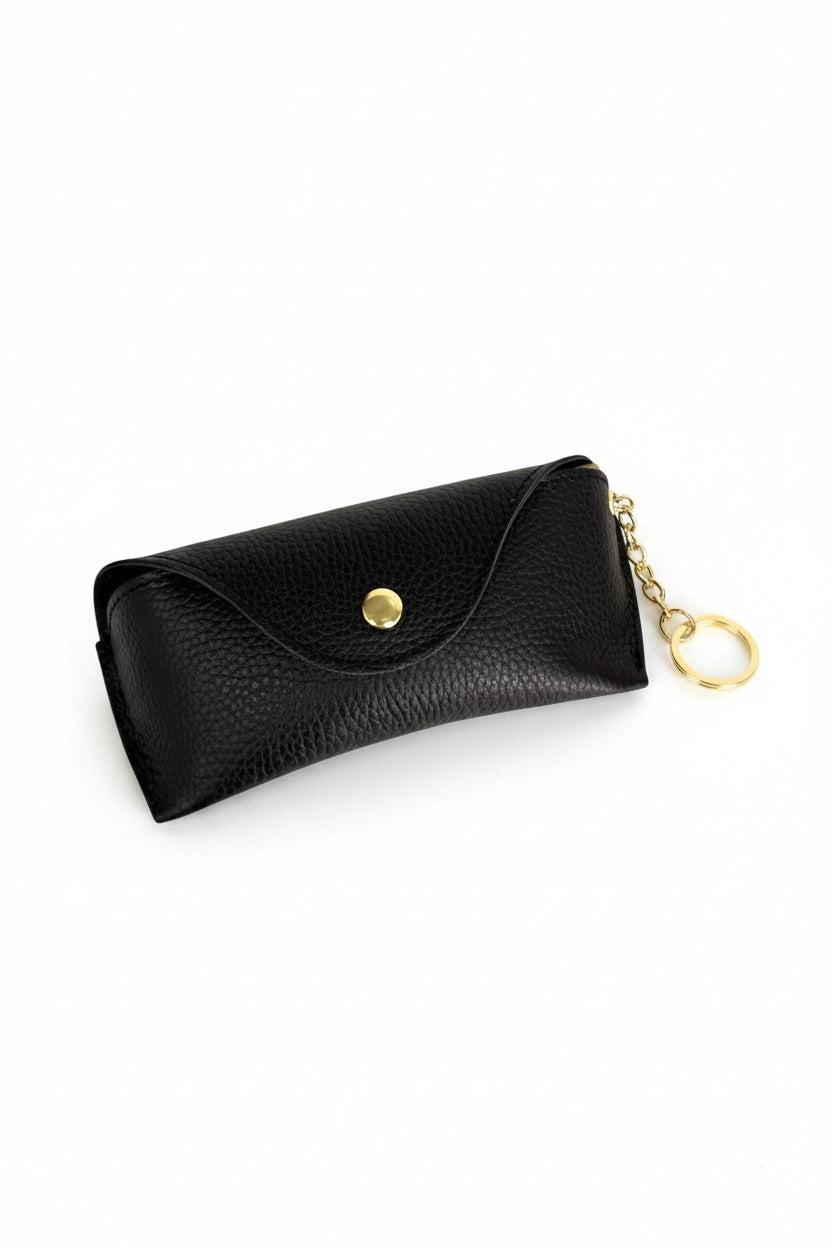 LE BORSETTE LEATHER EYEGLASS CASE IN BLACK featuring a gold snap closure and an attached key ring.