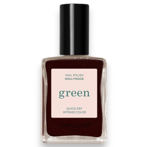 A bottle of MANUCURIST INC GREEN™ Nail Polish in the shade Hollyhock, featuring a dark burgundy color and a black cap.