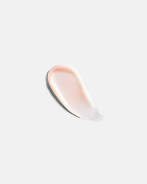 A gray tube of U BEAUTY THE PLASMA LIP COMPOUND 15ML, a hydrating lip treatment with a ribbed cap and minimalist design, stands upright against a white background.