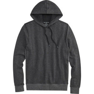 A person is shown from the back wearing the MACK WELDON - ACE HOODIE IN SHADOW HEATHER HERRINGBONE and gray pants, standing against a plain light gray background.