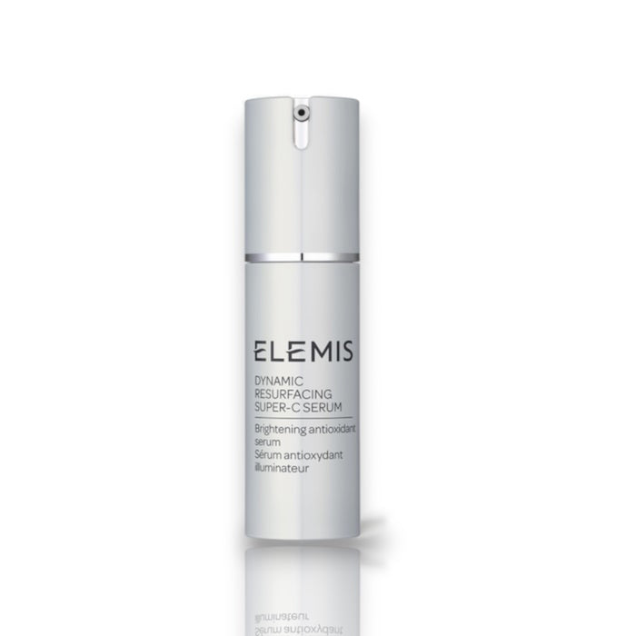 A sleek, white bottle of ELEMIS - Dynamic Resurfacing Super-C Serum from ELEMIS - Steiner is shown. Featuring a pump dispenser, the label text indicates it is a brightening antioxidant serum with Tri-Enzyme technology designed to illuminate the skin.