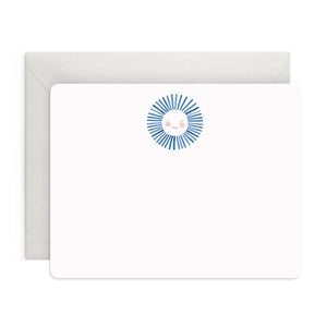 The E. FRANCES - FLAT NOTES BLUE SUNSHINE by E. FRANCES PAPER features a blank notecard with rounded corners and a cheerful sun at the top, paired with a plain white envelope—perfect illustrated stationery for hand-written notes on any occasion.