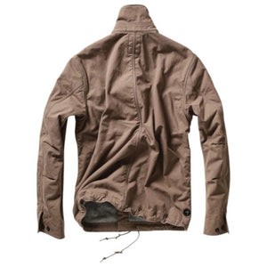 Three folded RELWEN Pile-Lined Chore Coats in Tobacco, Olive, and Charcoal are stacked, highlighting classic workwear style with buttoned front pockets and prominent stitching details. The rugged fabric texture and metal buttons of each RELWEN jacket are clearly visible.