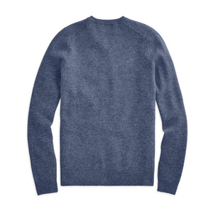 The MACK WELDON Tech Cashmere V Neck Sweater in Navy is laid flat on a white background, showcasing its ribbed collar, cuffs, and hem, along with a subtle heathered texture for style and comfort.