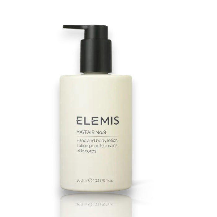 A sleek white bottle with a black pump dispenser cap, labeled "ELEMIS - MAYFAIR NO. 9 HAND & BODY LOTION" from the ELEMIS - STEINER brand, enriched with Shea Butter. The 300 ml (10.1 US fl. oz) bottle hydrates the skin, as indicated at the bottom of the label in both English and French.