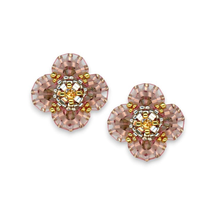 Introducing the MIGUEL ASES - FLOWER POST EARRINGS by MIGUEL ASES, INC., these stunning earrings feature intricate multi-colored beadwork. The petals are composed of transparent pink beads, adorned with sparkling Swarovski crystals at the center, forming a detailed and elegant floral design against a neutral background.