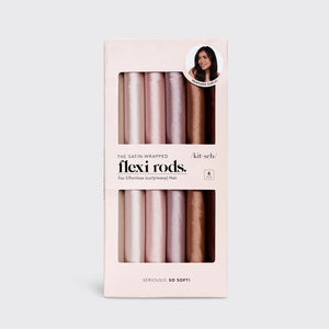Six satin-wrapped flexi rods from KITSCH are displayed on a light background in brown and pink, with some coiled and others straight—ideal for achieving effortless, heatless curls using this vegan hair roller set.