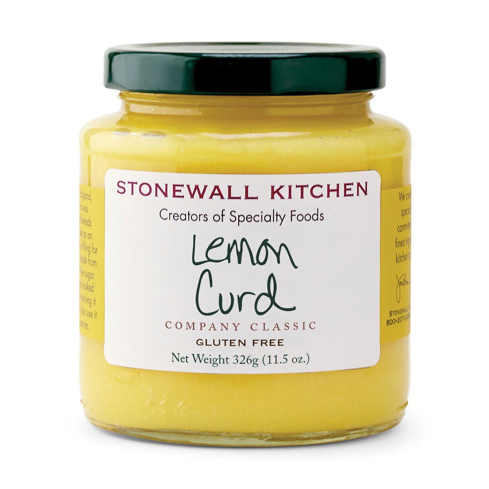 A glass jar with a dark green lid contains STONEWALL KITCHEN - LEMON CURD. The label reads &quot;STONEWALL KITCHEN Creators of Specialty Foods, Lemon Curd, COMPANY CLASSIC, GLUTEN FREE, Net Weight 326g (11.5 oz.).&quot; The curd is yellow and offers the sweet tartness of traditional English-style custard.