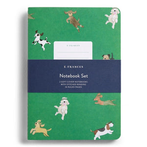 The E. FRANCES - STITCHED NOTEBOOKS OFF LEASH, SET OF 2 by E. FRANCES PAPER features one notebook with green stripes and a dog illustration, and another adorned with playful pups—perfect for pet lovers’ stationery needs.