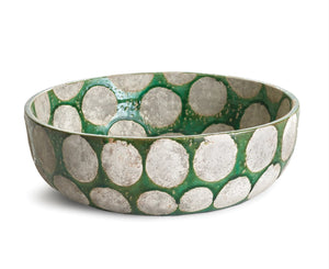 The NAPA HOME AND GARDEN KILEY BOWL IN GREEN is a round ceramic bowl with a glossy green base and bold silver circles on its surfaces, reflecting mid-century style. Shown here on a white background, it's perfect as a decorative fruit bowl.