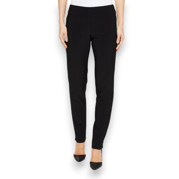 A person stands against a white background wearing KRAZY LARRY, INC.&#39;s MICROFIBER PULL ON PANT - LONG in sleek black, complemented by high heels. The 32&quot; inseam enhances the elegance and simplicity of their attire, as the top remains out of view.
