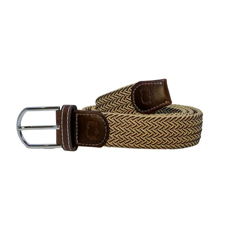 A person wears a red-striped shirt tucked into light khaki pants, styled with the ROOSTAS - TUCSON WOVEN STRETCH BELT by ROOSTAS. Their hand rests near their pocket.