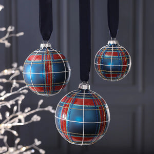 ZODAX GLASS PLAID ORNAMENT BALL, a round 4.75-inch glass Christmas ornament with a red and blue plaid pattern accented by glittery stripes.