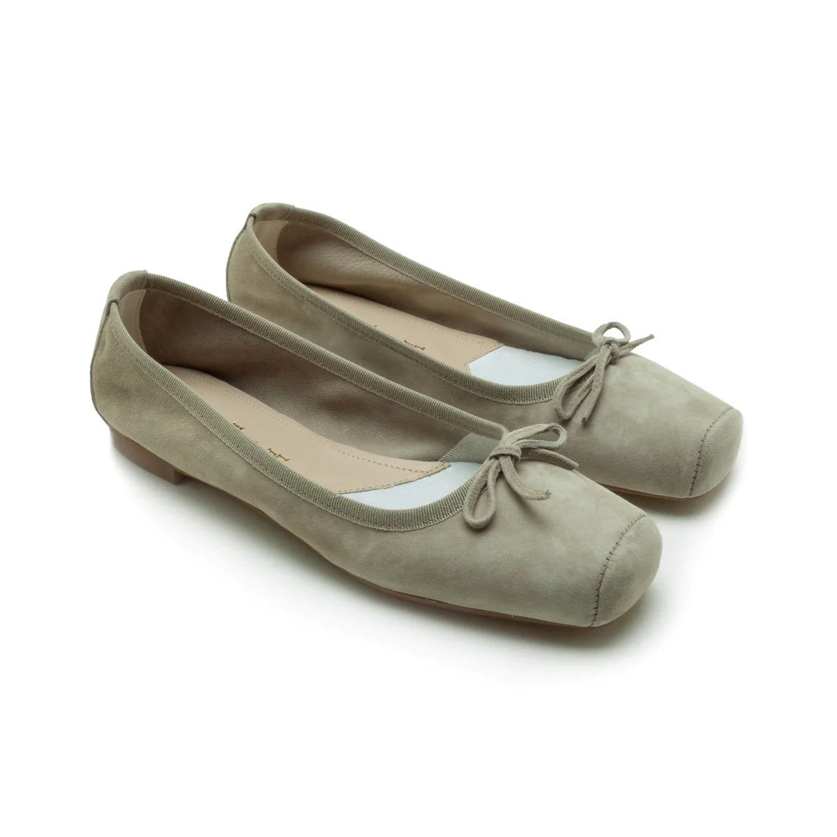 The MICHELE LOPRIORE - PALOMA ballet flat with a square toe, crafted from genuine silver leather, features a delicate bow on the front and a low-profile brown sole. Made in Italy, this elegant shoe is set against a plain white textured background.