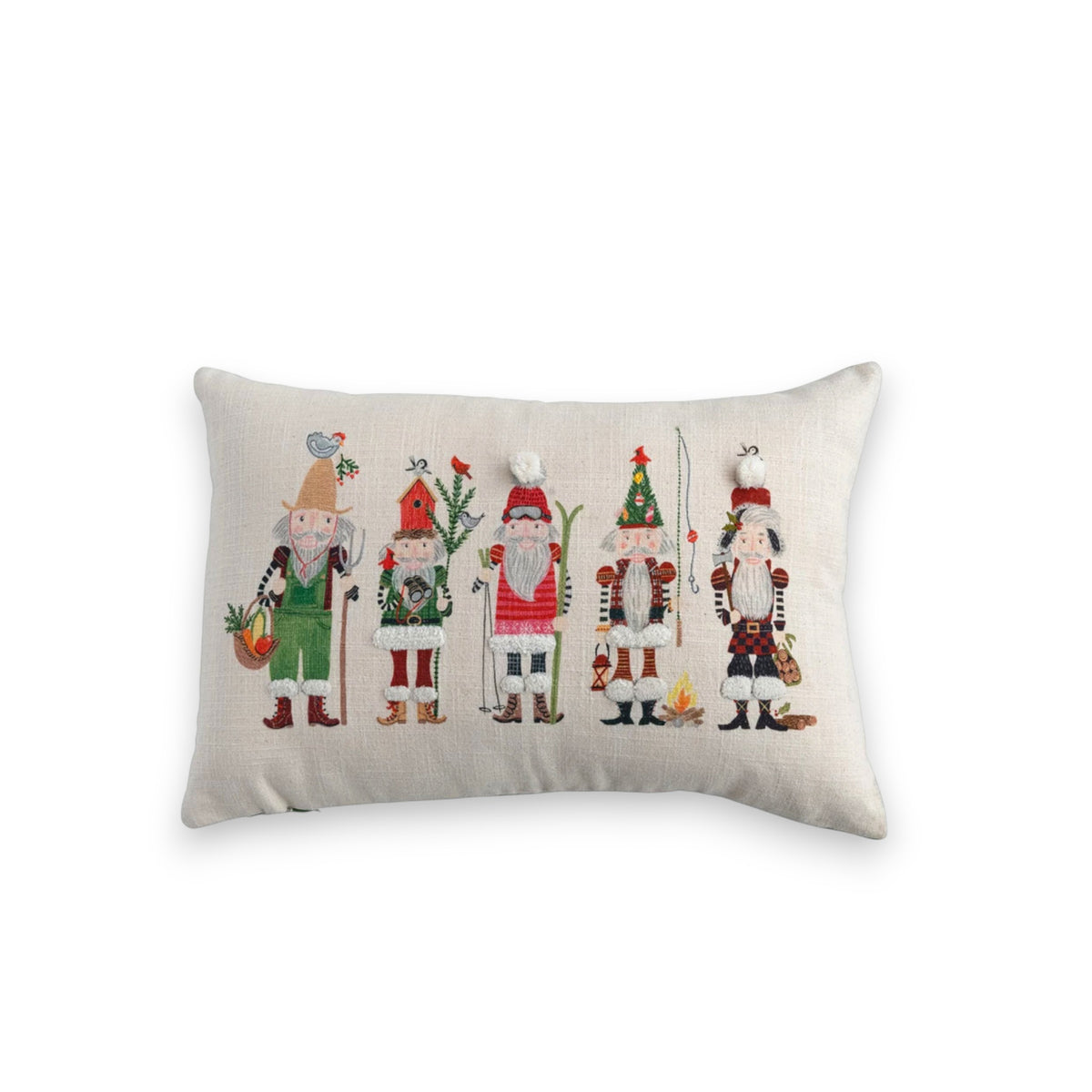 The CREATIVE COOP LUMBAR PILLOW WITH NUTCRACKERS is a rectangular beige pillow with five festive embroidered nutcracker figures—ideal as a lumbar or decorative accent for your home.
