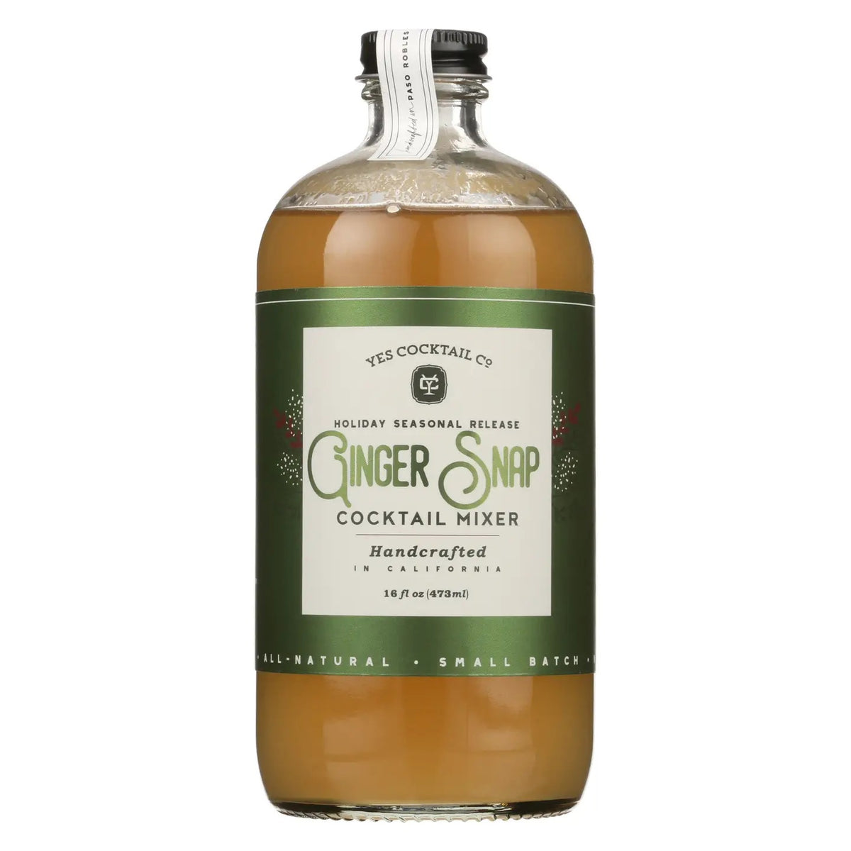 A bottle of YES COCKTAIL CO. - GINGER SNAP COCKTAIL MIXER featuring a green label with holiday-inspired details and a black cap. The label highlights that it’s a handcrafted, all-natural cocktail mixer from YES COCKTAIL CO., made in small batches—making it the perfect choice for festive drinks during the holiday season.
