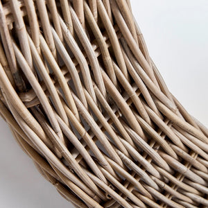 The NAPA HOME AND GARDEN - KYLAN ROUND MIRROR features a natural woven rattan frame, highlighting rustic texture against a white backdrop. Its simplicity and elegance make it ideal for any home decor.