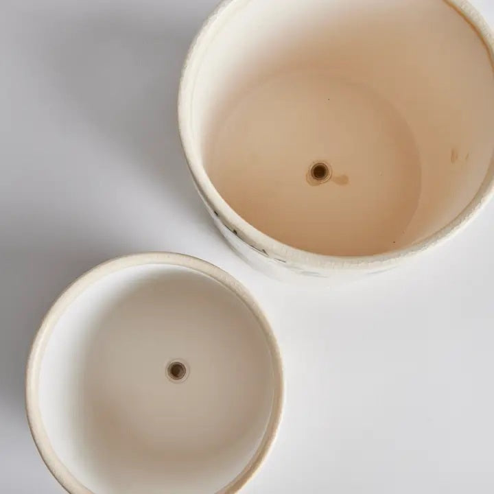 The NAPA HOME AND GARDEN Maren Pot, Small, features embossed leafy designs on white ceramic—a perfect orchid vessel to pair with its larger counterpart for a coordinated display.