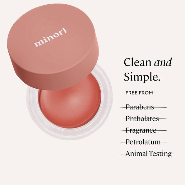 A single swatch of MINORI - CREAM BLUSH in Scarlet sweeps across a white background, revealing its creamy texture and rich pigment—capturing the effortless glow of a natural-looking blush from MINORI.