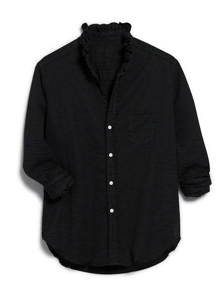 The FRANK &amp; EILEEN Ruffle Eileen Ruffle Collar Button Up Shirt in Famous Denim Blackout features long sleeves, white buttons, a single chest pocket, and a ruffled collar, shown laid flat against a white background.