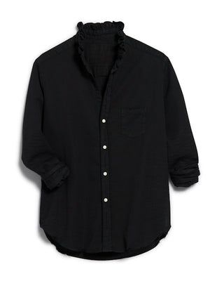 The FRANK & EILEEN Ruffle Eileen Ruffle Collar Button Up Shirt in Famous Denim Blackout features long sleeves, white buttons, a single chest pocket, and a ruffled collar, shown laid flat against a white background.