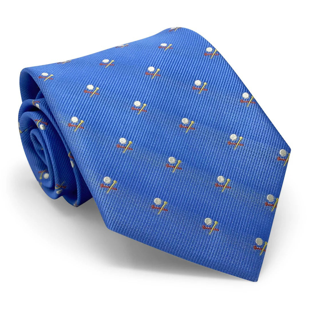 The PETER BLAIR - GOLF BALL AND TEE TIE by BIRD DOG BAY is a blue woven silk tie featuring a repeating pattern of small embroidered golf balls on tees with golf clubs.
