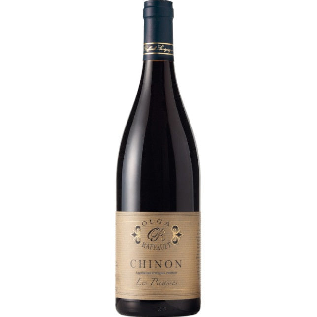 A bottle of OLGA RAFFAULT ‘LES PICASSES’ CHINON 2020 red wine from WINE: HAW RIVER WINE MAN, featuring a beige label and a dark blue foil cap, crafted from Cabernet Franc grapes and photographed against a white background.