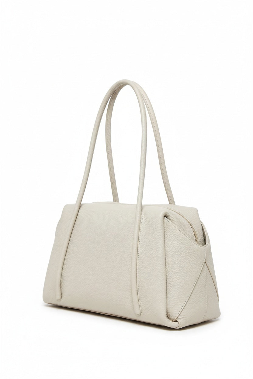 Fearrington Village OLIVEVE Solara satchel in light grey Italian buffalo cowhide leather with rope-detailed handles.