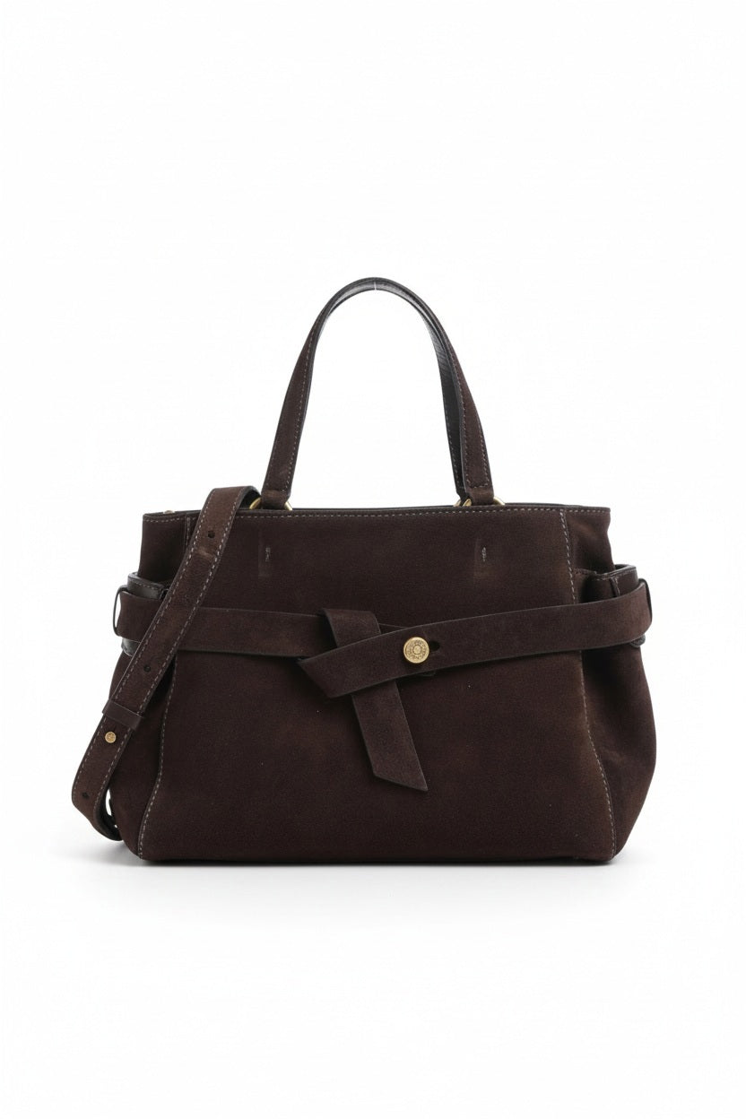 The GIANNI CHIARINI Maranda Handbag in Mocha features dark brown suede, two short handles, a long adjustable shoulder strap for crossbody versatility, and a decorative front belt with a gold button, shown against a white background.