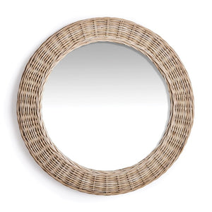 The NAPA HOME AND GARDEN - KYLAN ROUND MIRROR features a natural woven rattan frame, highlighting rustic texture against a white backdrop. Its simplicity and elegance make it ideal for any home decor.