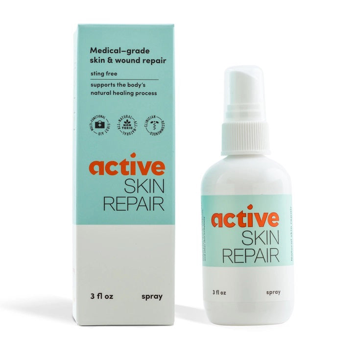 A white spray bottle labeled &quot;ACTIVE SKIN REPAIR - SPRAY ACTIVE SKIN REPAIR&quot; sits at the center of a gray background. Below it, professional mountain biker Brian Lopes shares his testimonial, praising the effectiveness of this hypochlorous (HOCl) formula from ACTIVE SKIN REPAIR for various skin issues and wound care.