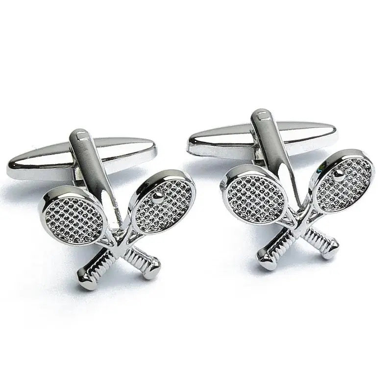 STOLEN RICHES - TENNIS RAQUET CUFFLINKS by STOLEN RICHES feature detailed, crossed silver rackets—an ideal gift for tennis fans and a stylish men’s accessory, perfect for any collection.