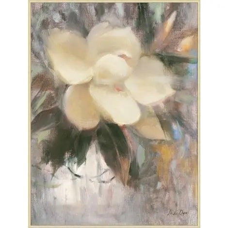 MAGNOLIA BLOSSOM 2 ARTWORK by WENDOVER features a soft-focus depiction of a grand cream-colored magnolia flower with lush green leaves, set against a blurred backdrop of muted grays, browns, and subtle accent hues. Available as a gallery wrapped canvas or in an elegantly finished floater frame, this piece brings refined beauty to any space.