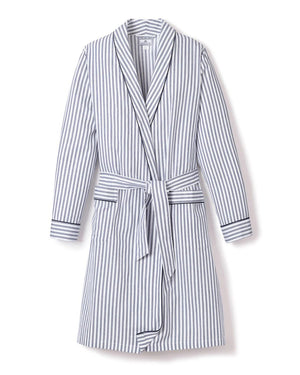 The FEARRINGTON LIFESTYLE COLLECTION - WOMEN'S TWILL ROBE IN NAVY FRENCH TICKING by PETITE PLUME is a knee-length, long-sleeved robe with a tie belt at the waist. Crafted from the finest quality cotton, it features vertical navy and white stripes with matching striped cuffs on the sleeves. This piece of luxurious sleepwear boasts two front pockets and a shawl collar for added comfort.