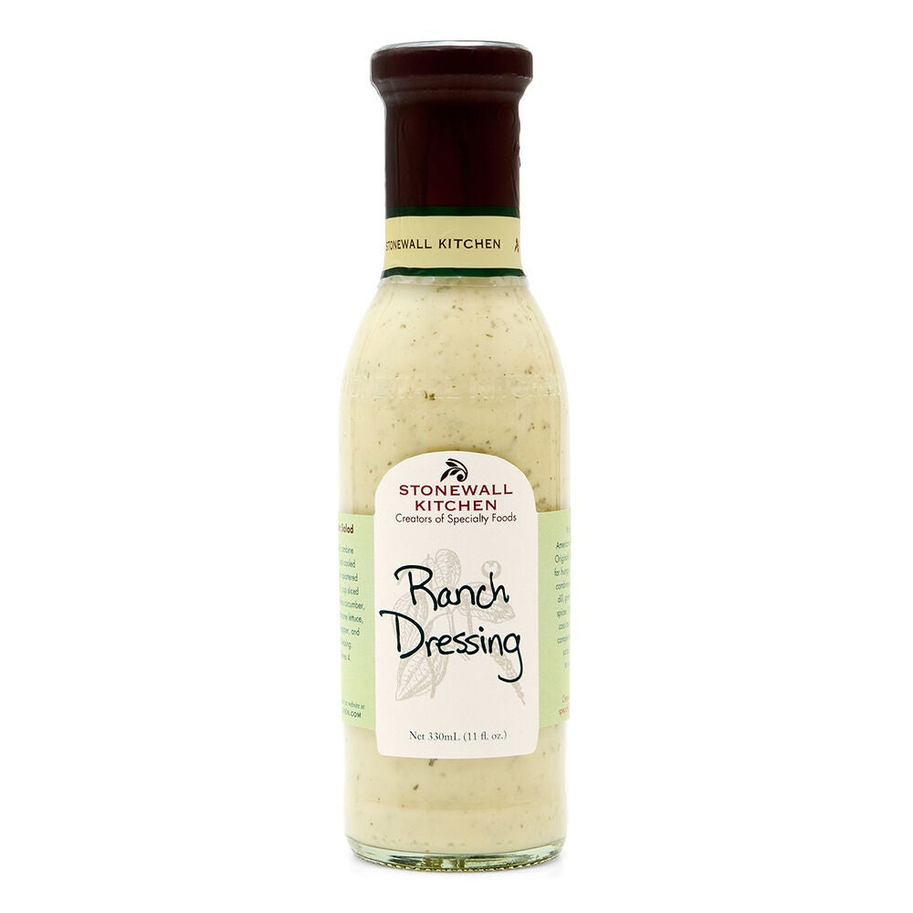 A bottle of STONEWALL KITCHEN - RANCH DRESSING from STONEWALL KITCHEN, featuring a green and white label and a dark brown cap, contains 11 ounces of creamy buttermilk ranch salad dressing.