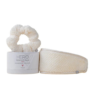 The VOLO BEAUTY - PERFECT PAIR HEADBAND AND SCRUNCHIE features a soft, cream-colored spa headband and a gentle Nanoweave scrunchie, both fluffy and textured, beautifully packaged together by VOLO BEAUTY.