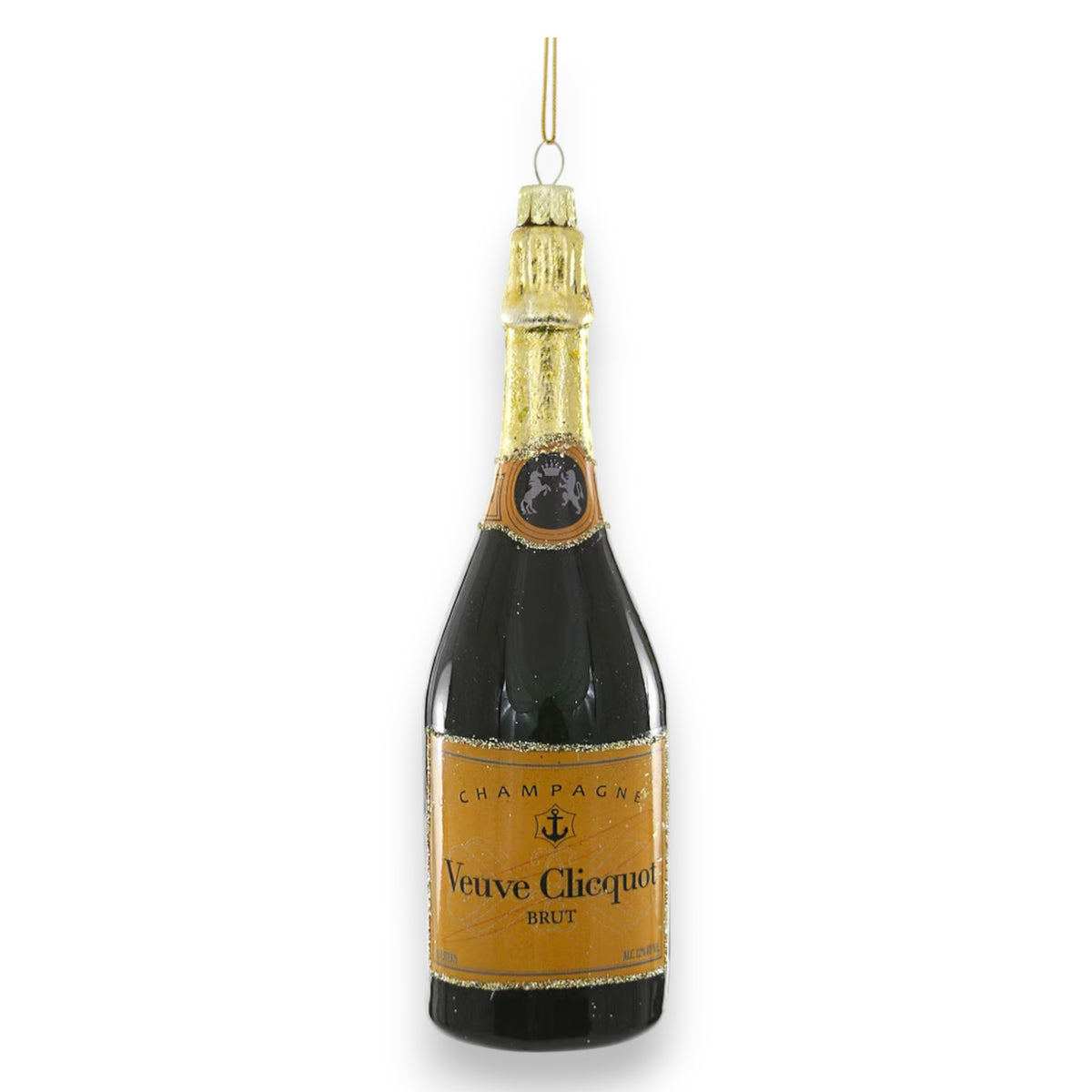The CHAMPAGNE BRUT ORNAMENT by CODY FOSTER is a Christmas tree ornament shaped like a Veuve Clicquot bottle, featuring a gold foil neck, orange label, and gold string—ideal for collectors and design enthusiasts seeking unique gifts.