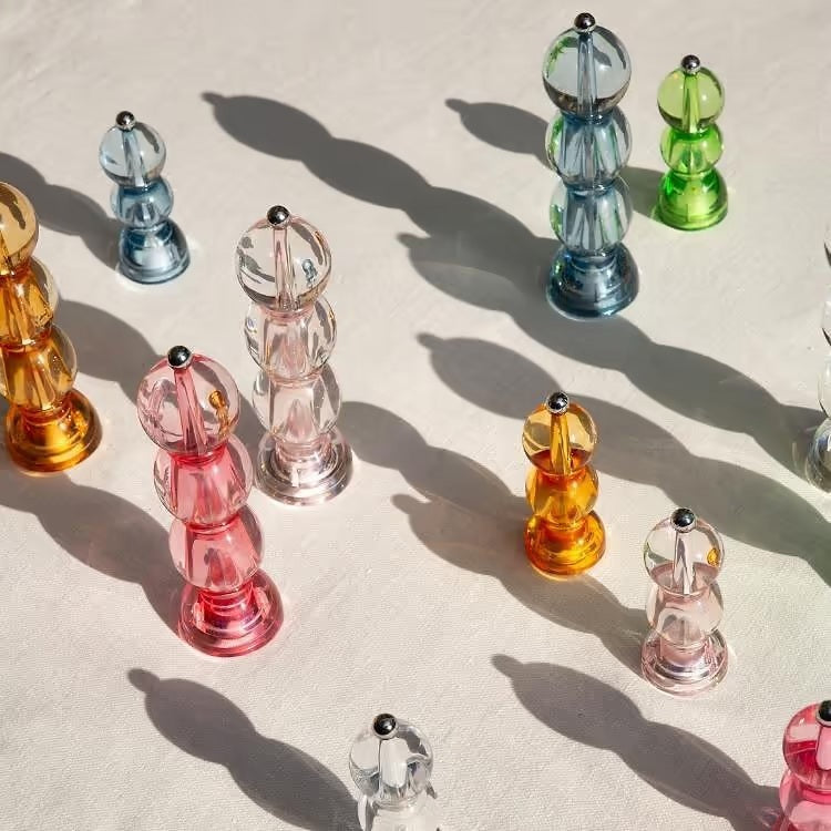 The ADDISON ROSS LONDON MINI BOB SALT OR PEPPER MILL 14CM features a clear bulbous acrylic body, round top knob, and a ceramic grinder, standing upright against a white background.