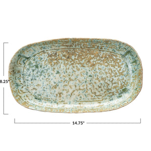 The GREEN STONEWARE PLATTER WITH REACTIVE CRACKLE GLAZE by CREATIVE COOP features a handcrafted, rustic finish and textured green glaze—perfect as a unique serving dish for any occasion.