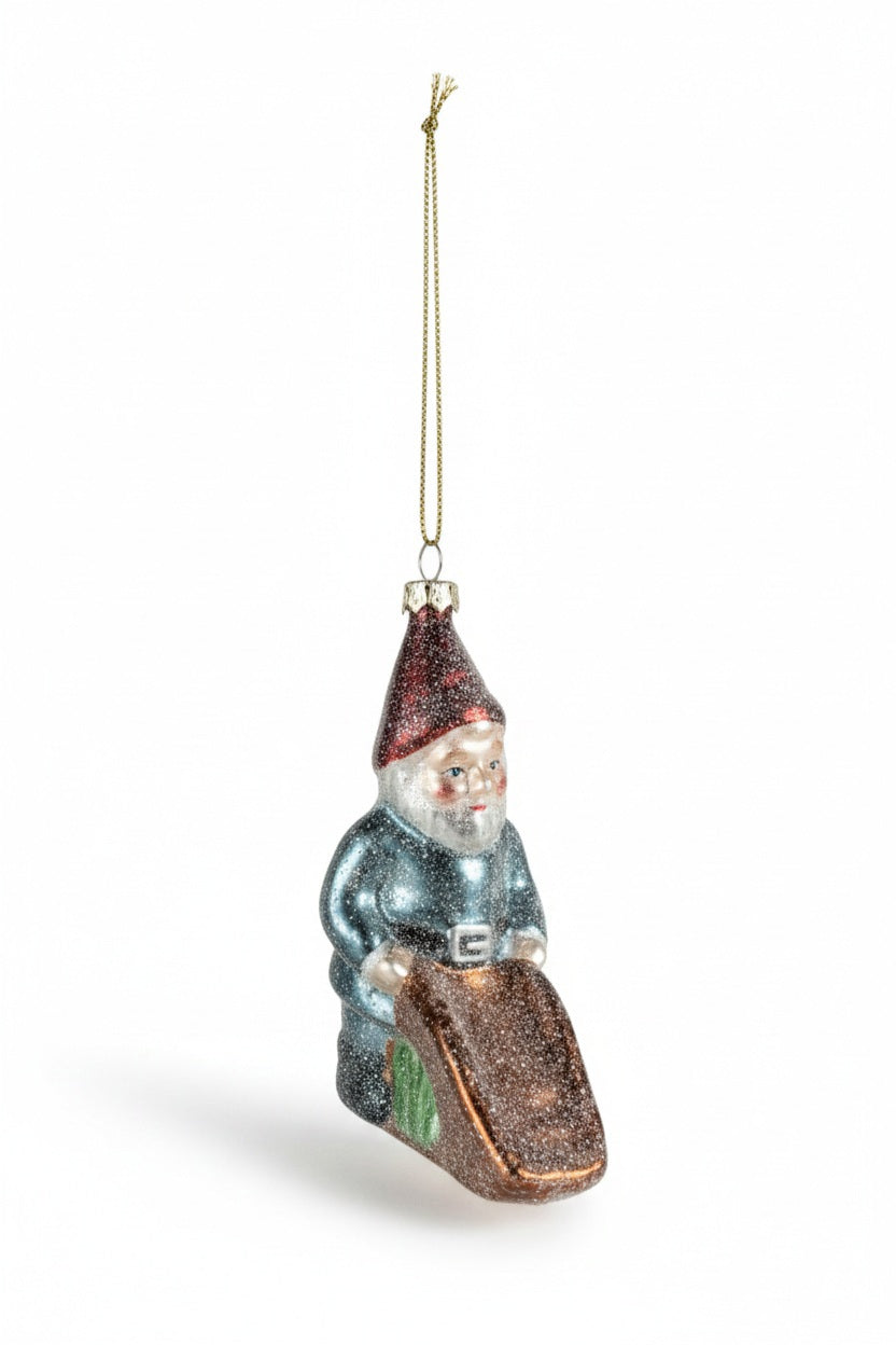 Glittery glass GARDEN GNOME ORNAMENT pushing a wheelbarrow.