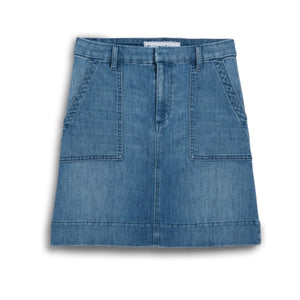The FRANK & EILEEN Jameson Utility Skirt in Italian Dream Light Denim 1968 Wash is a blue mini skirt with utility pockets, belt loops, and a front zipper closure, shown against a white background.
