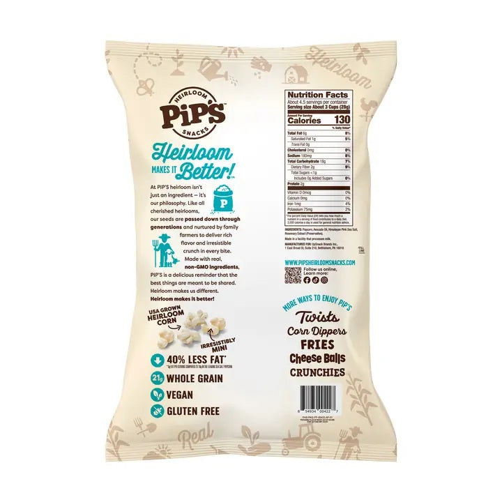 A bag of PIPCORN - SEA SALT POPCORN shown next to a smaller, older version of the PIP’S HEIRLOOM SNACKS packaging.
