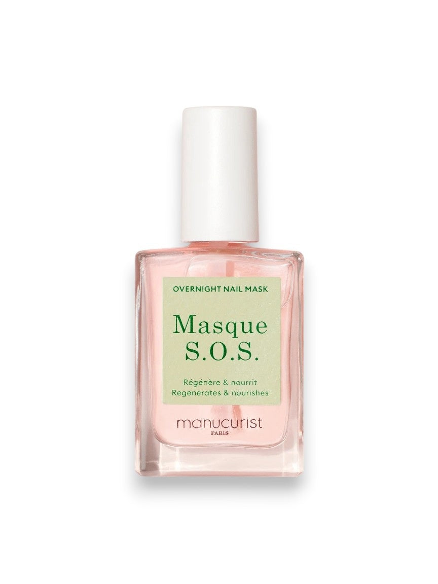 A clear glass bottle of MANUCURIST INC MANICURIST - S.O.S. NAIL MASK featuring pink liquid, a white cap, and a green label. This hydrating night care formula is designed to repair and restore damaged nails.