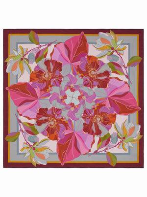 The FRANCO FERRARI - CIALDA Reversible Silk Scarf 90x90 features a symmetrical, oversized floral pattern in purple, brown, cream, and black with mirrored stylized flowers and leaves radiating from the center.