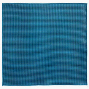 The CLIFTON WILSON Teal Houndstooth Cotton Pocket Square, made in the USA, is neatly folded and displayed on a white background.